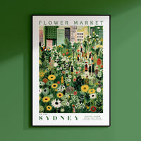 a green wall with a picture of a flower market