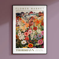 a flower market poster hangs on a wall