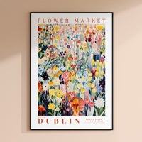 a flower market poster hanging on a wall