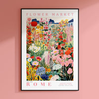 a flower market poster hangs on a pink wall