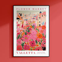 a red wall with a poster of a flower market