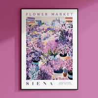 a poster of flowers on a pink wall