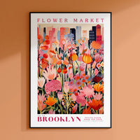 a flower market poster hangs on a wall