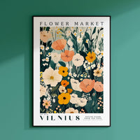 a flower market poster hanging on a wall