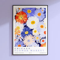 a poster hanging on the wall of a flower market