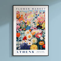 a flower market poster hanging on a wall