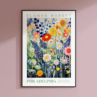 a painting of flowers on a pink wall