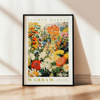 a flower market poster hanging on a wall