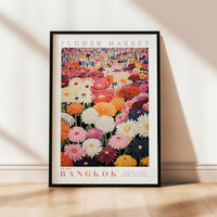 a flower market poster hanging on a wall