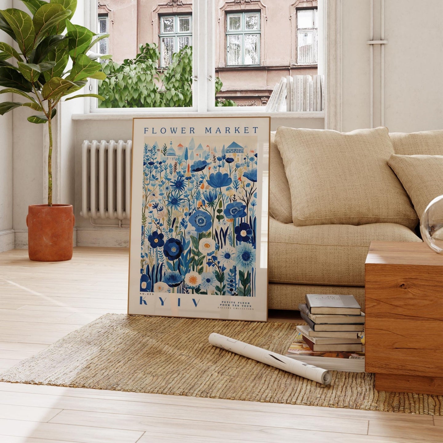 a living room with a flower market poster on the floor
