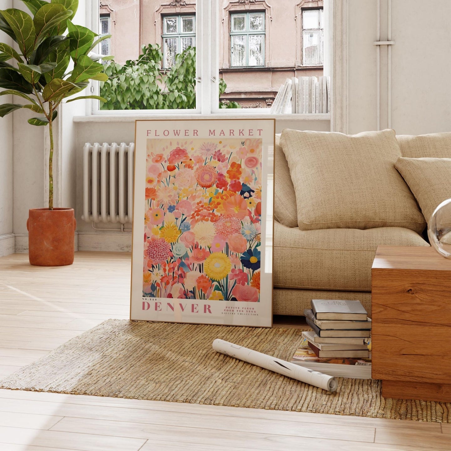 a living room with a couch and a poster on the floor