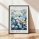 a picture of a flower market poster hanging on a wall