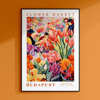 a flower market poster hangs on a wall