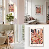 a living room filled with furniture and a flower market poster