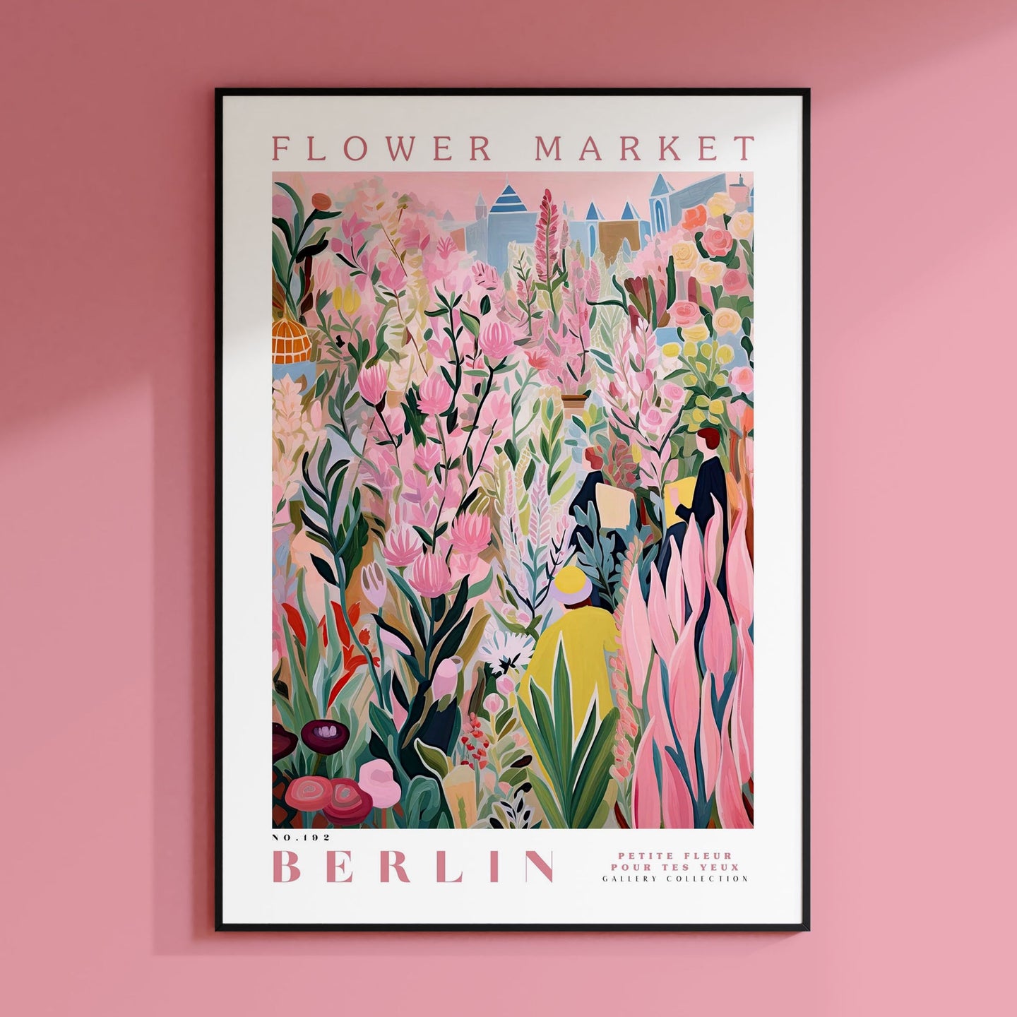 a pink wall with a picture of flowers on it