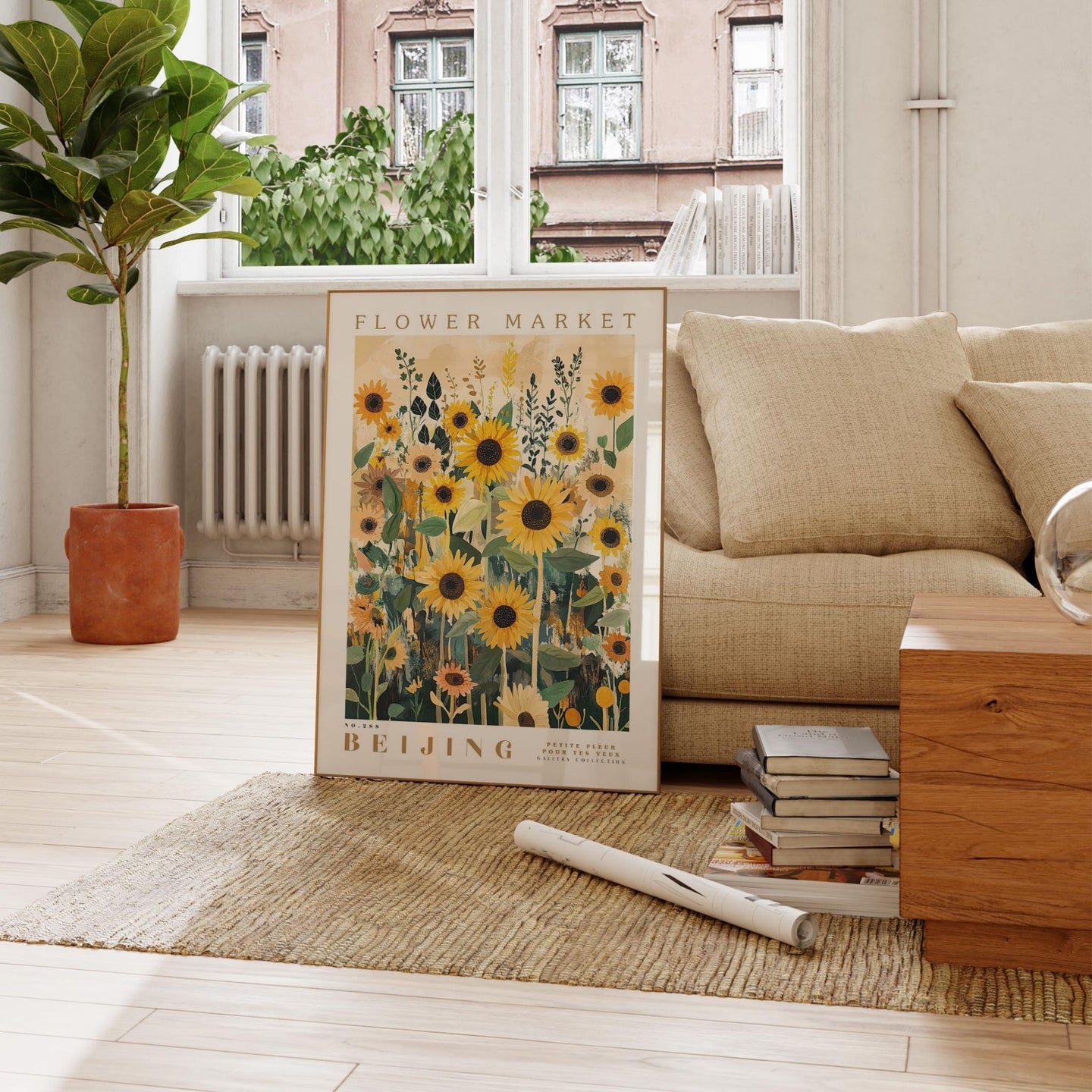 a living room with a couch and a poster on the floor