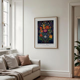 a living room with a couch and a painting on the wall