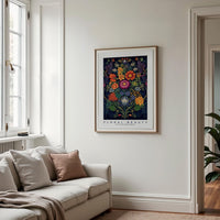a living room with a couch and a painting on the wall