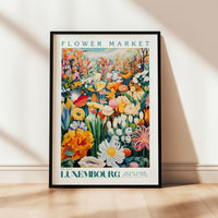 a flower market poster hanging on a wall