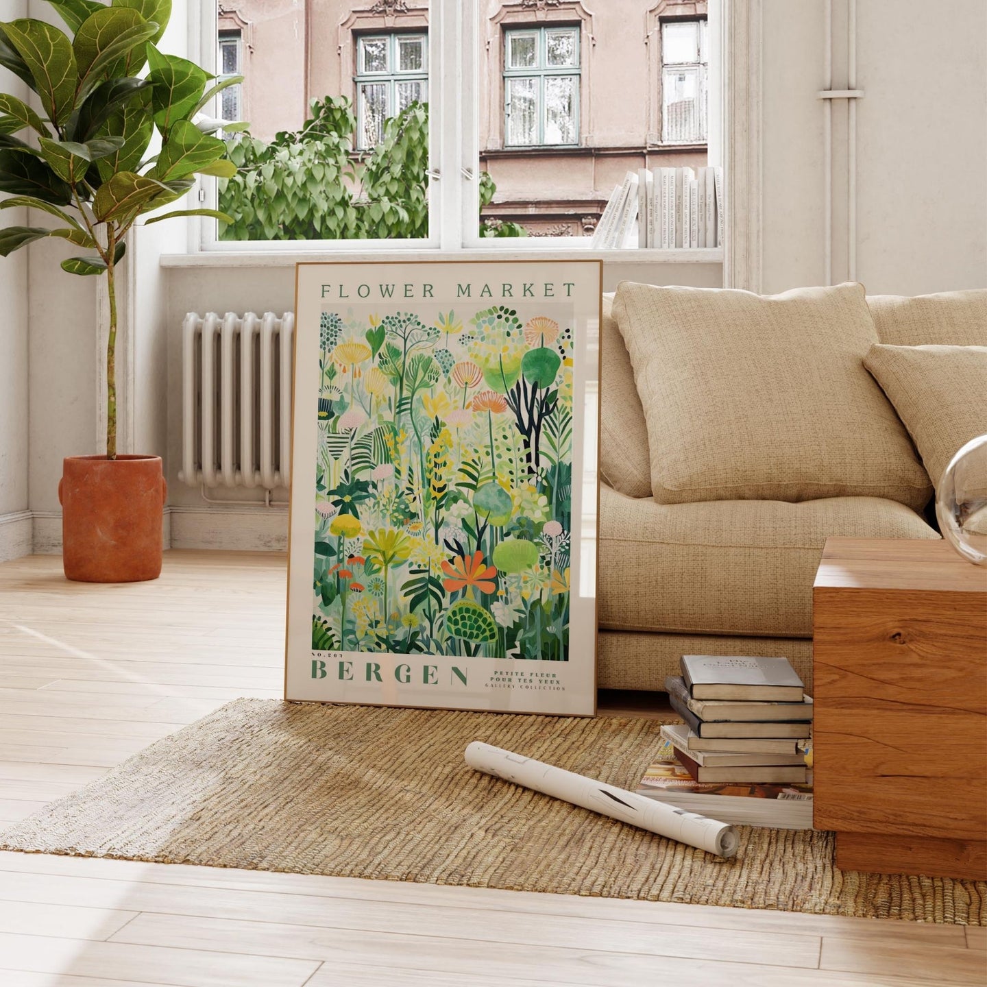 a living room with a couch and a poster on the floor