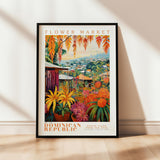 a picture of a flower market poster hanging on a wall