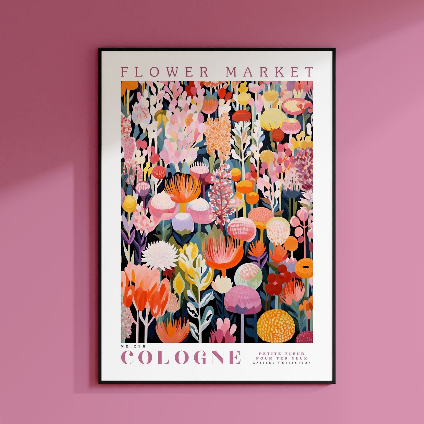 a pink wall with a picture of flowers on it