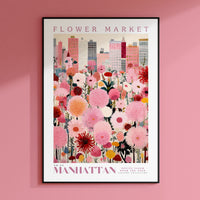 a pink flower market poster hanging on a pink wall