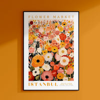 a flower market poster hanging on a wall