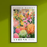 a green wall with a picture of flowers on it