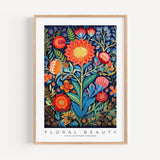 a painting of flowers and leaves on a white wall