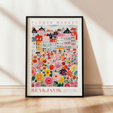 a flower market poster hanging on a wall