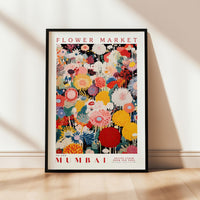 a flower market poster hanging on a wall