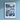 a poster hanging on the wall of a blue room