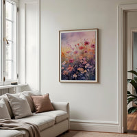 a living room with a couch and a painting on the wall
