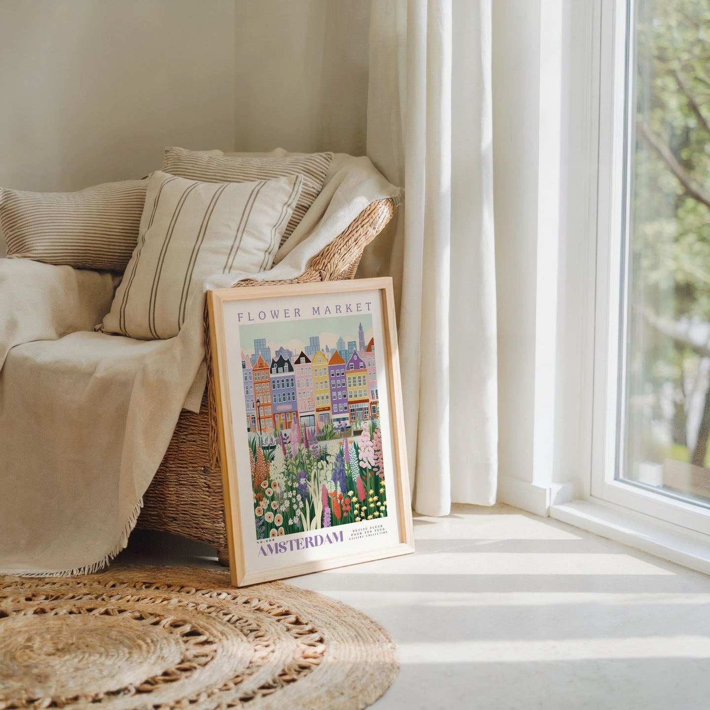 a picture frame sitting on a rug next to a window