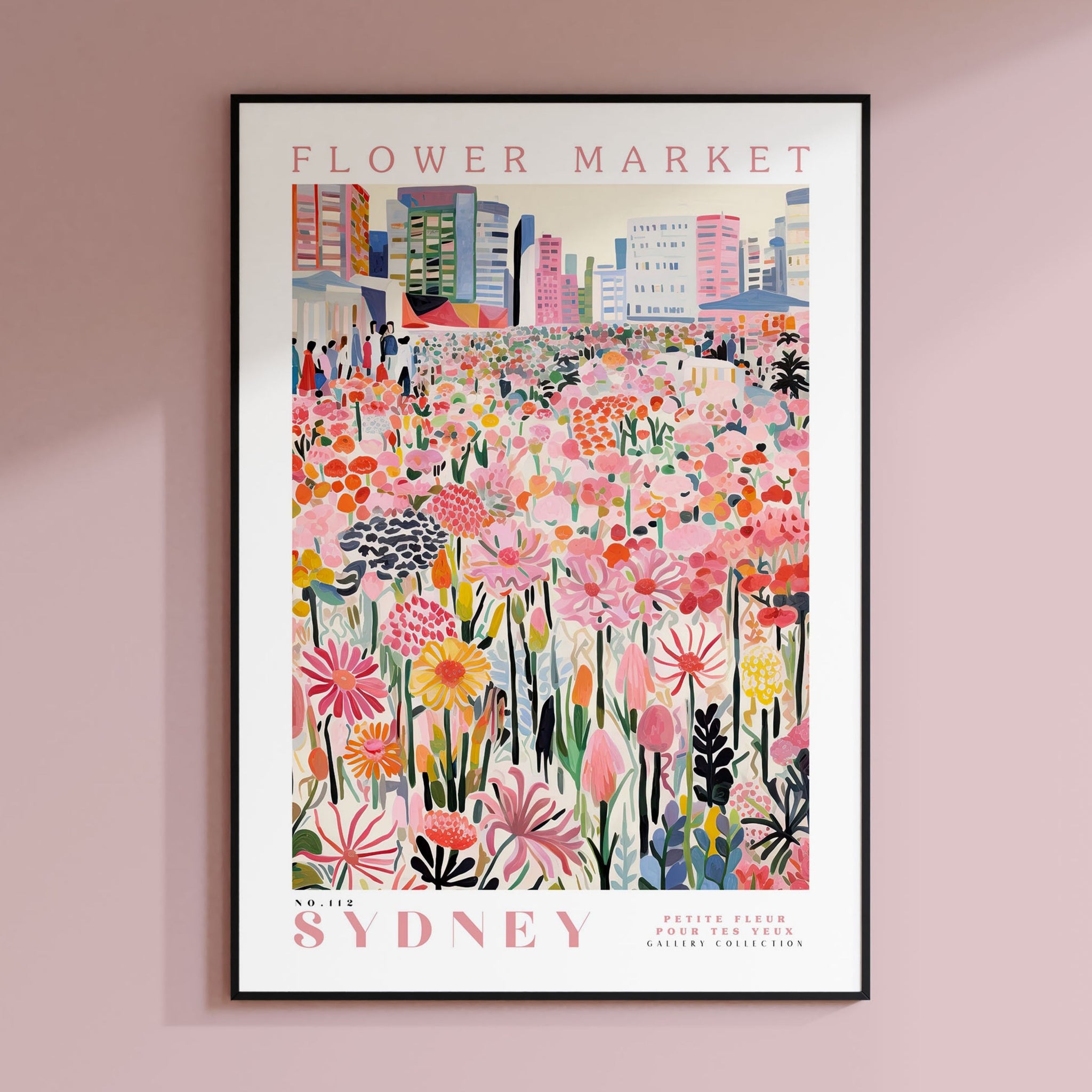 a poster hanging on the wall of a pink room