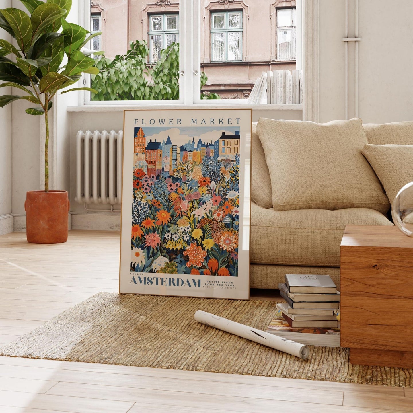 a living room with a couch and a poster on the floor