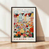 a flower market poster hanging on a wall
