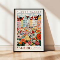 a flower market poster hanging on a wall