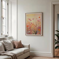a living room with a couch and a painting on the wall