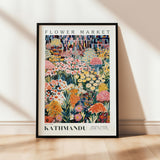 a flower market poster hanging on a wall