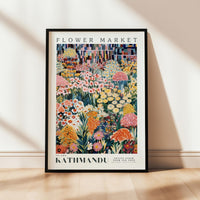a flower market poster hanging on a wall