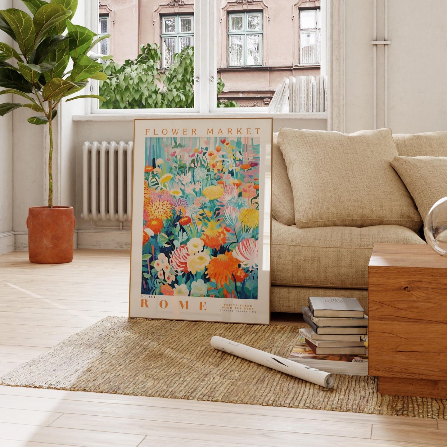 a living room with a couch and a poster on the floor