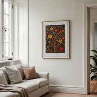 a living room with a couch and a painting on the wall