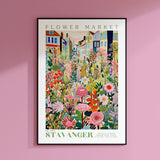 a pink wall with a picture of a flower market