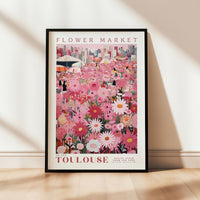 a flower market poster hanging on a wall