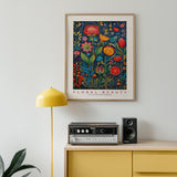 a painting hanging on a wall above a radio