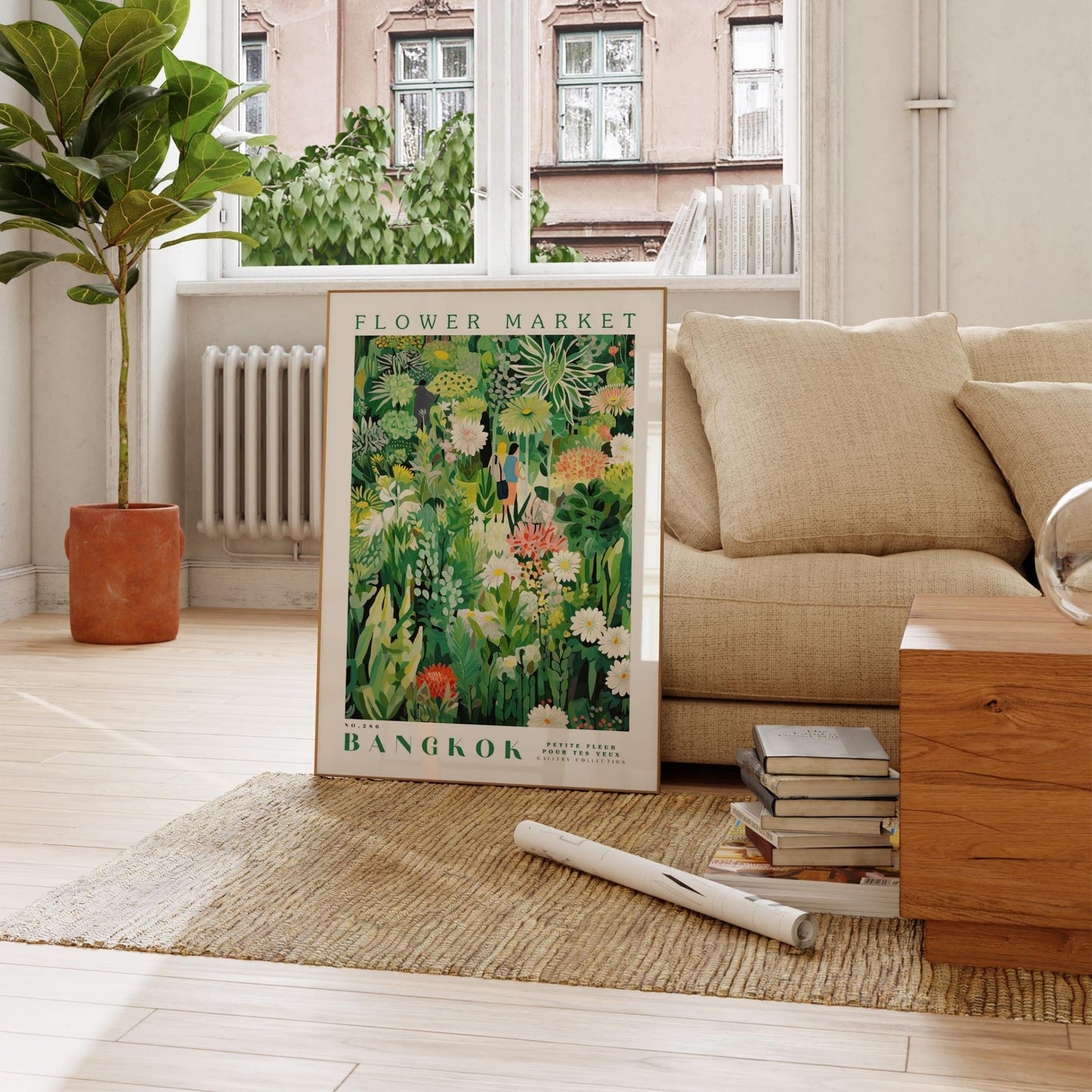 a living room with a couch and a poster on the floor