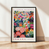 a flower market poster hanging on a wall