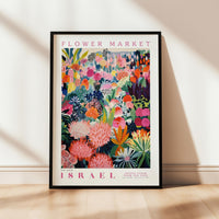 a flower market poster hanging on a wall